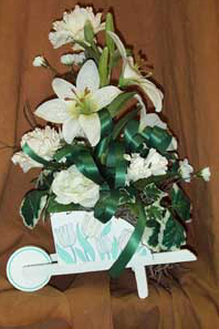 Saint Patrick's Day Keepsake arrangement with white lilys, 	montecasiono and carnations