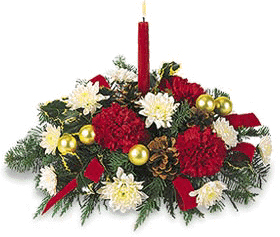 Holiday centerpiece filled with holiday greens, red carnations, white mums, pine cones and holiday decor